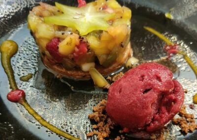 Dessert at la ferme manoir saint barthélemy, a table d'hôtes bayeux, with fruit tart, sorbet, and crumble.