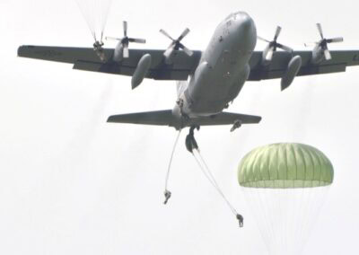 Paratroopers jumping from a C-130 during L'Histoire du Débarquement et de la Bataille de Normandie.